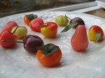 Fruit-shaped Marzipan:  Thai yellow-bean paste marzipan shaped into fruits (popular street food dessert found abundantly in Thailand),  Submitted by Pwint Htun