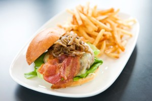 Chutney Burger: grass fed beef, BeecheraE™s cheddar, bacon, onion chutney and lettuce.