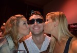 One lucky little german boy named Jason gets smooched by Maureen Wallins and Stephanie Altieri.
