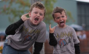 They may not have all their teeth, but brothers Brayden and Ryder Sawyer have all their rock poses down pat.