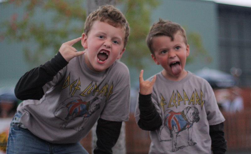 They may not have all their teeth, but brothers Brayden and Ryder Sawyer have all their rock poses down pat.