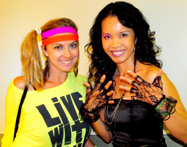 Cara Vande Berg in day-glo off the shoulder, and Victoria Voris in fingerless gloves.