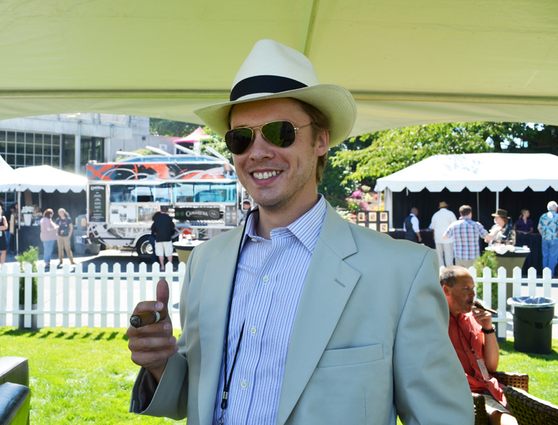 Campbell Austin looks smokinaE™ in his Fedora, suit, and aviators.
