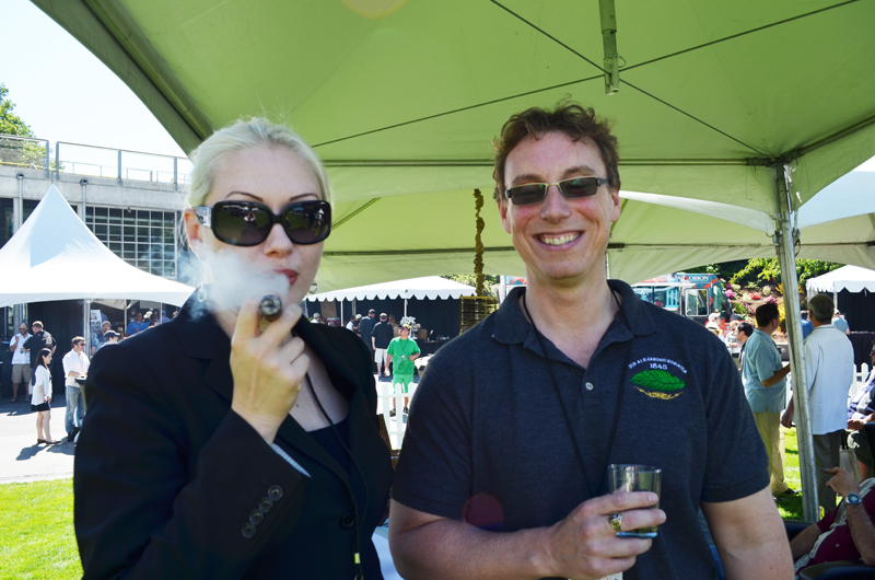 Dale R. North and Dean Davison keep it cool under the tents.