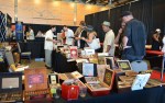The Everett Cigar and Tobacco booth selling their wares to the Expo attendees.