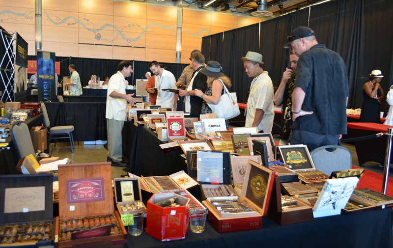 The Everett Cigar and Tobacco booth selling their wares to the Expo attendees.