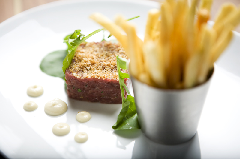 I much preferred a block of beef tartare served with a garlicky aioli and slender, rosemary-flecked fries.