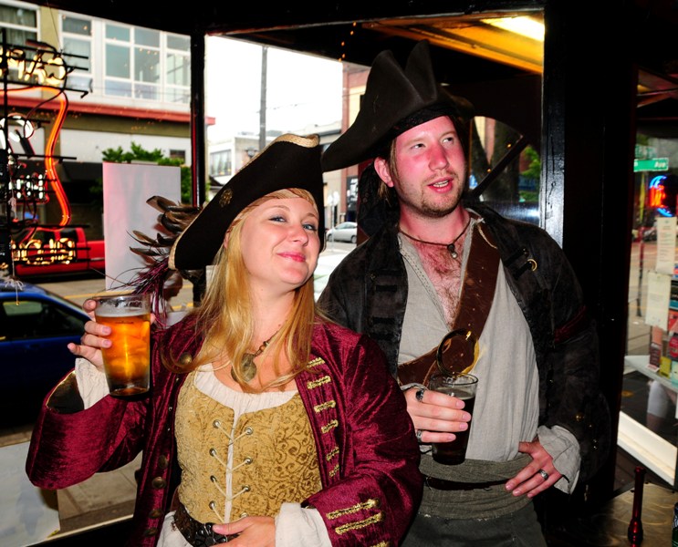 Ravina the Red and Master Reynard, professional pirates recently arrived from New York.