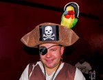 Raul Alvarez with his pirate parrot.