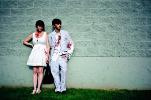 A nonchalant zombie couple at the Red, White and Dead Zombie Walk in Fremont. Want to see more of the Guinness World Record breaking walk? Check it out here.