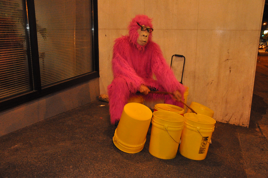 This pink monkey played drums at Pine and Broadway after the block party ended Friday night.