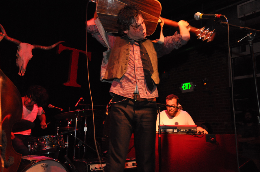 When a cowboy grows up punk, or a punk grows up in the country, he does things like change his name to one fit for an old Western and play guitar behind his head.