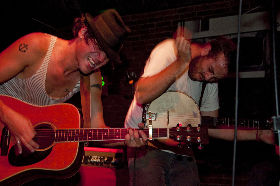 David Moore (right) is the best banjo player in the world. The smears on the banjo may or may not be blood.