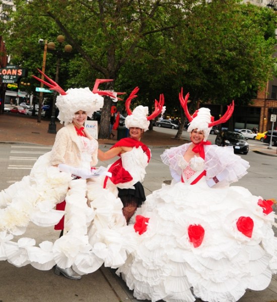 Beth Dodrill, Jana Rekosh, and Kristie Maxim in the paper gowns they have created.