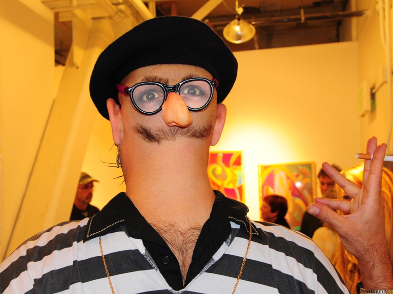 At TK Studios, Gandhi Jones (aka Keith Haubrich) selectively shaves the back of his head for this effect.