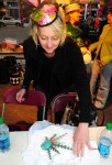 Mikele Keiffer wraps one of her custom-designed hats.