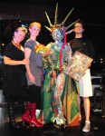 Artists Kira Richards, Dita Olson and Bradley Reed with Lady Liberty (created with model Lillian Afful) during First Thursday ArtWalk. Mallory Benston was also involved in the design.