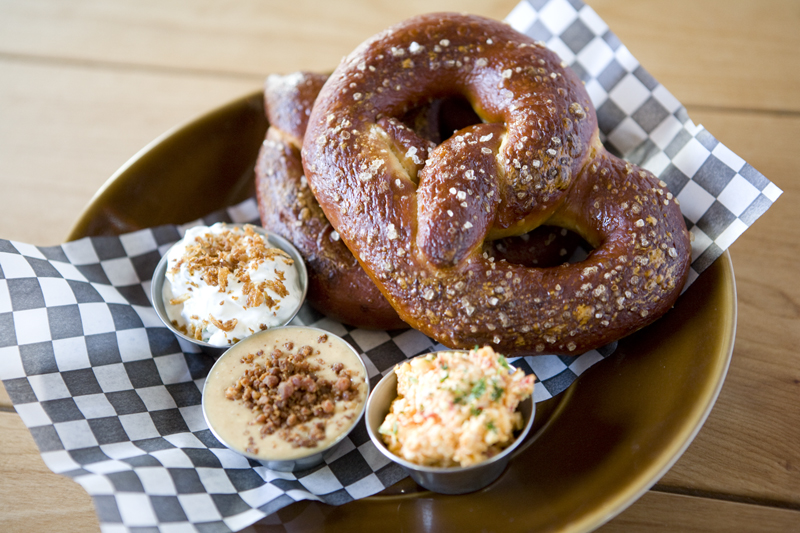 Brave Horse, restaurant three of the Tom Douglas trio, knows just how to garnish a soft pretzel.