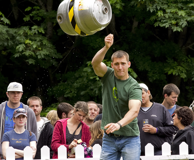 A contestant in the Washington Brewer's festival keg toss.