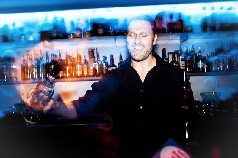 Pnk Ultra Lounge bartender Blake Webb shows off behind the bar at the Siff Gay-La.