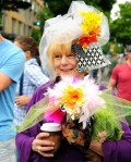 Missy peeks out from beneath her flower hat that matches owner Brenda VanHorn's.