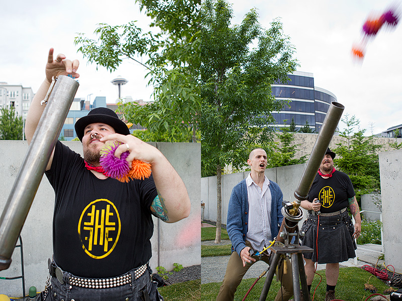 Phillip launches balls into the air with an air canon during SAM Party In The Park at the Olympic Sculpture Park.
