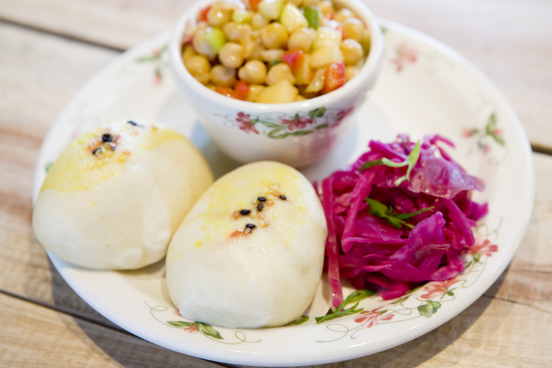 TINGMO - Tibetan Soft Steamed Bread Dumplings with shiitake mushroom, bamboo shoots, yellow curry, and currants.