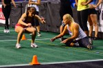 Demonstrating the proper form of a drop in pop, lock and drop it