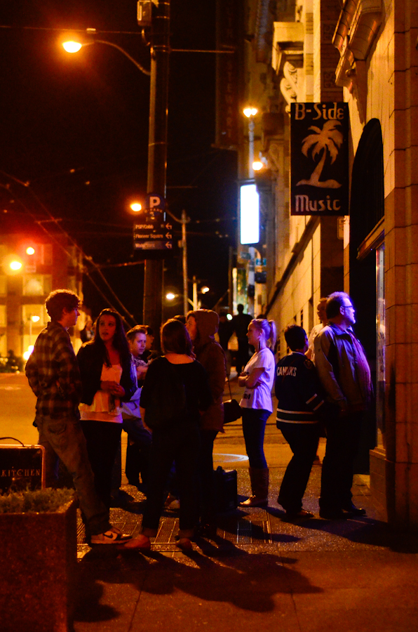 Under the cover of darkness music fans emerge...