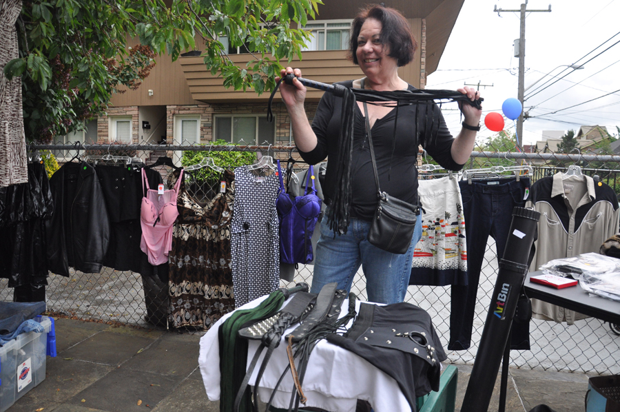 A woman selling her whips and other naughty tidbits.