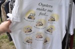 A shirt showcasing the many moods of oyster eating.