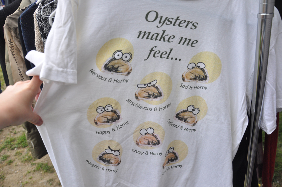 A shirt showcasing the many moods of oyster eating.