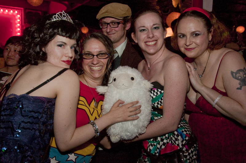 Women flock to a man and his sheep date.