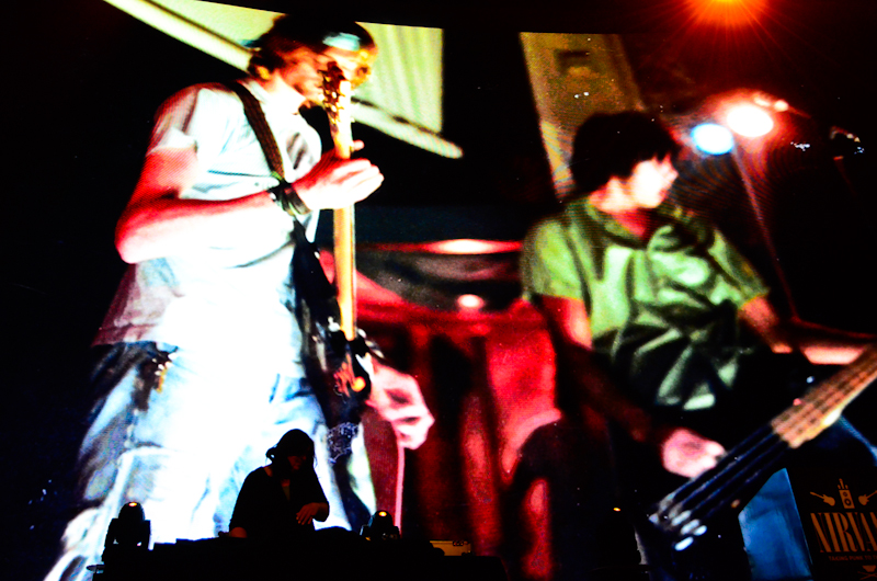 A massive screen displayed images from Nirvana's career.