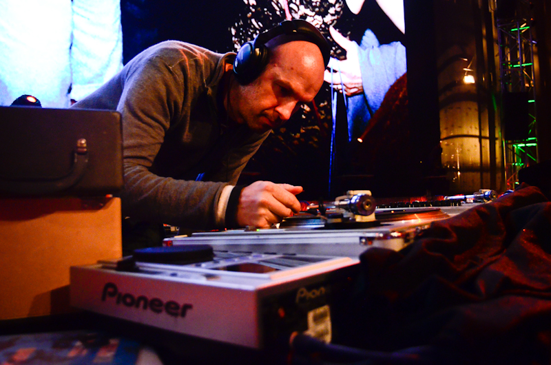 Charles Peterson (Grunge Era Photographer) DJ'd for a while while making sure to take some photographs from the stage.