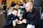 Pete Neicon shares a cherry pie with his son, Rory.
