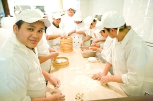 Making dumplings: a team effort.