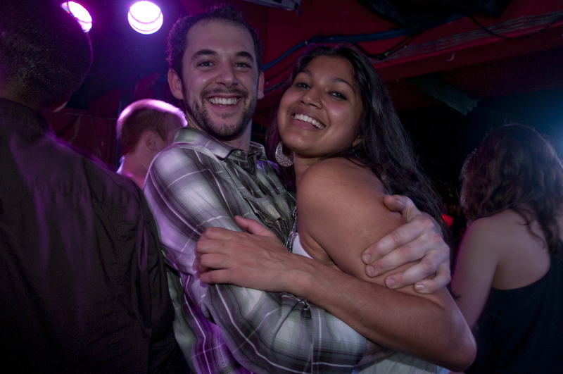 A happy couple dancing on stage