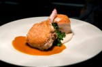 Duo of pork aE“ roasted chop, crispy belly, lacinato kale, white bean puree, maple bourbon jus.