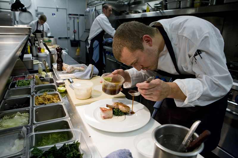 Chef Rob Putting the final touch on the duo of pork.