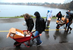 Youth groups and volunteers light more than 5,000 luminarias along the 3.1 mile path around the lake.