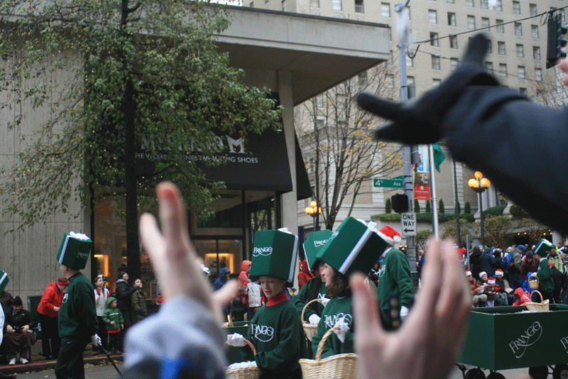 Hands flew up when people dressed as Frangos - Macy's addictive chocolate candy - flung actual Frangos into the crowd.
