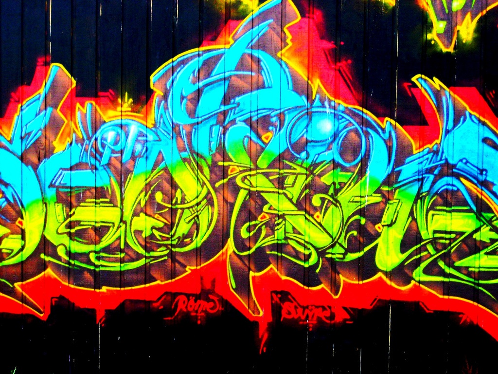 The photographer snapped this photo while visiting Seattle and can't remember the exact location - But it was in a neighborhood where I'd least expect to find graffiti -- one with upscale stores, etc.! she wrote.