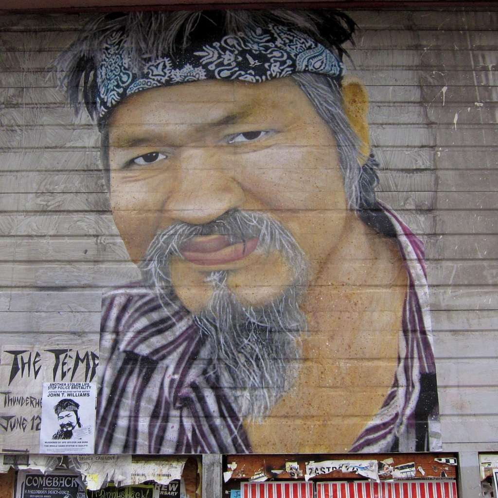 This mural, by artist NTG (No Touching Ground) appeared on Capitol Hill and commemorated John T. Williams, the Seattle man shot earlier this fall by a Seattle police officer.