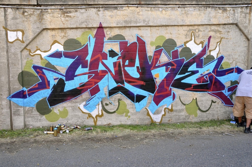 This photo captures Sam Sneke's work in progress; he created this piece for the closing of the South Park Bridge.