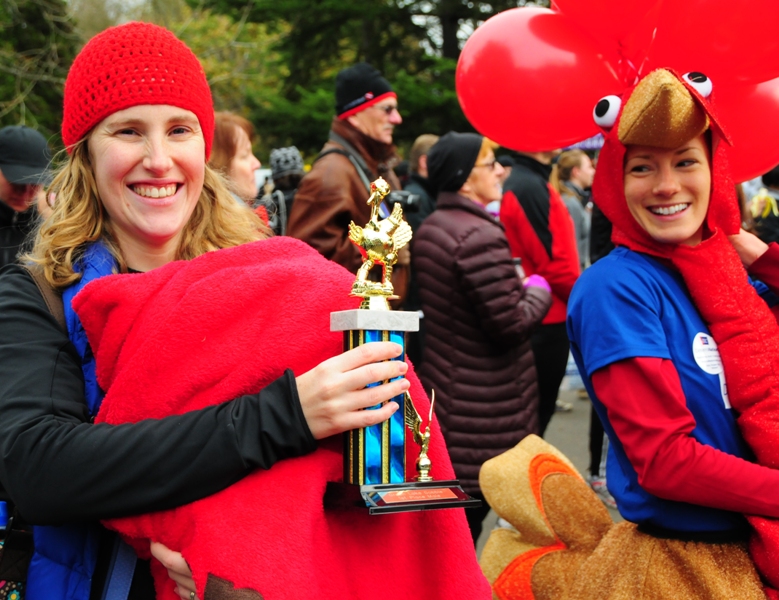 Steve DekokeraE™s wife and new baby accepted the menaE™s first place award on his behalf.