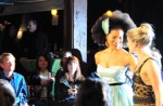 Designer Cameron Levin on the runway with model Marshay Mitchell.