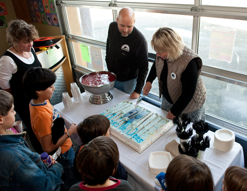 The cutting of the cake.