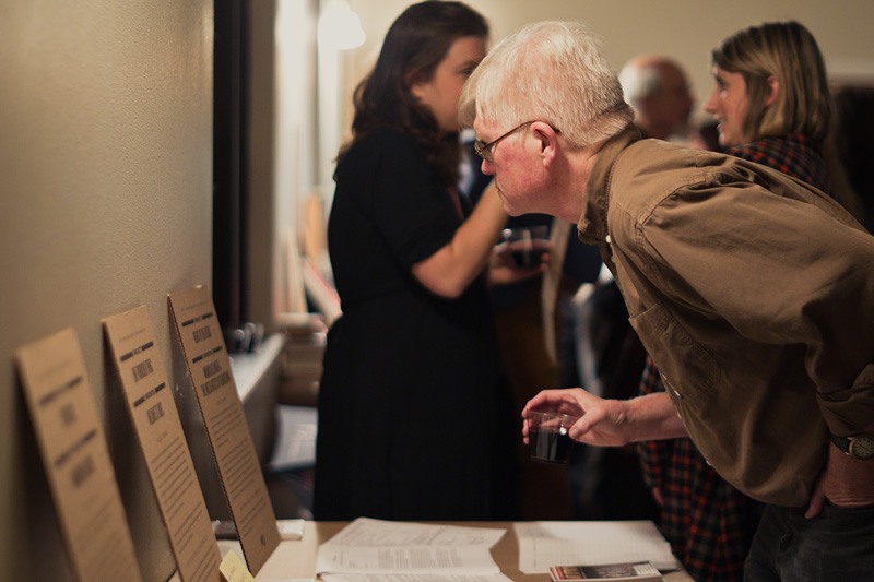 A guest reads the art project materials.