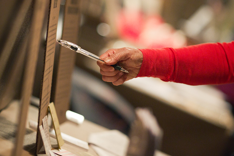 A guest prepares to vote.